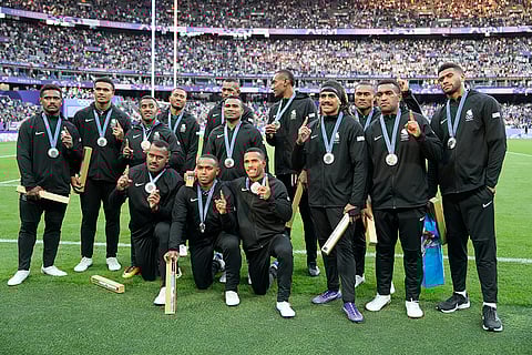 Women's Rugby Sevens: Fiji team pose with their silver medals